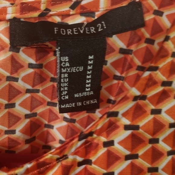 Forever 21 peplum style patterned blouse Size M. - Picture 2 of 4